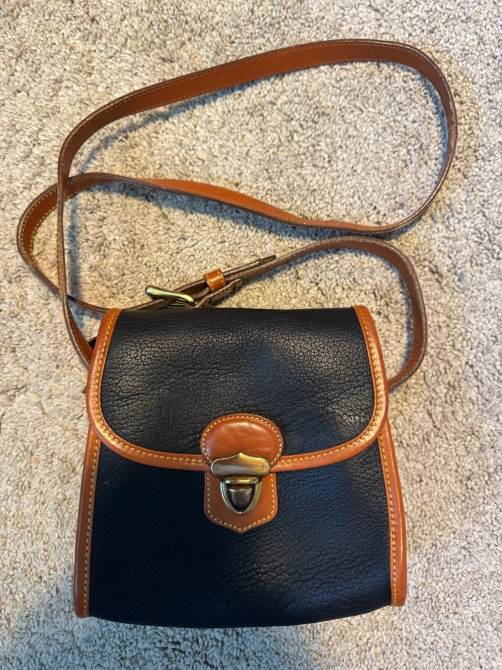 Dooney & Bourke Vintage All Weather Black and Tan Leather Bag
